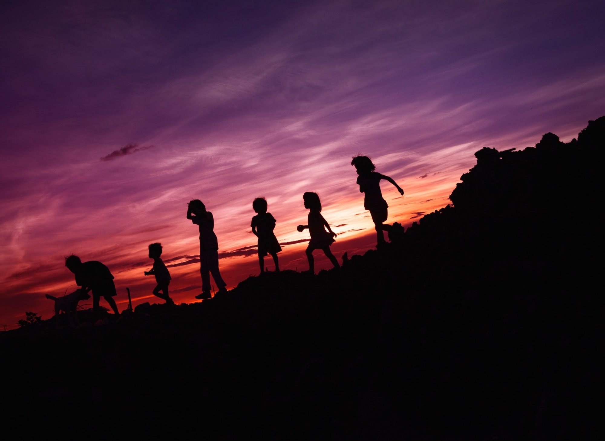 Group of children walking outside