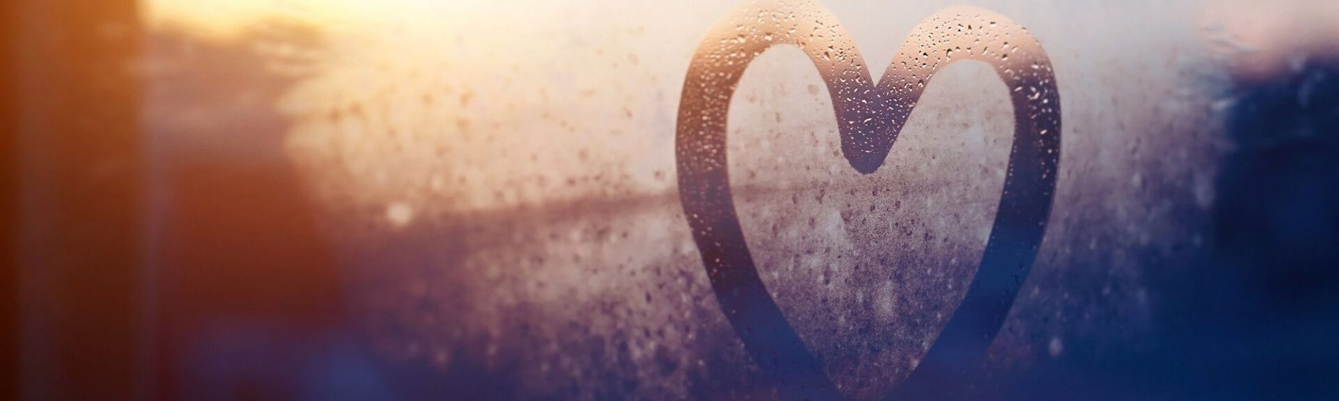 Heart shape on steamy glass